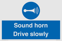 sound-horn-drive-slowly-warehousing-and-delivery-sign~